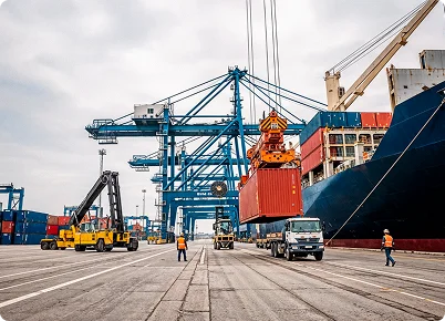 Container port with cranes loading a cargo ship